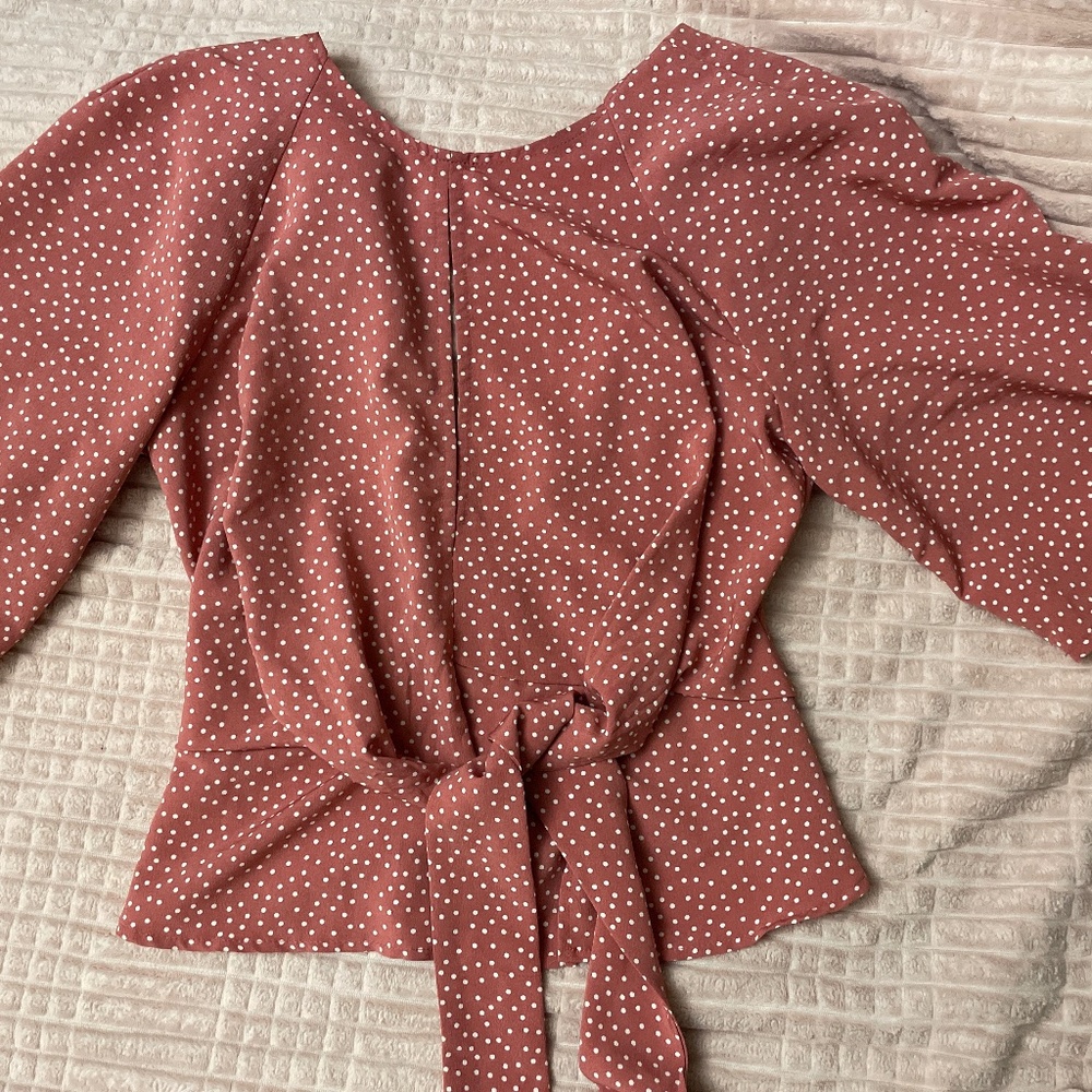 Pink and white polka dot top
